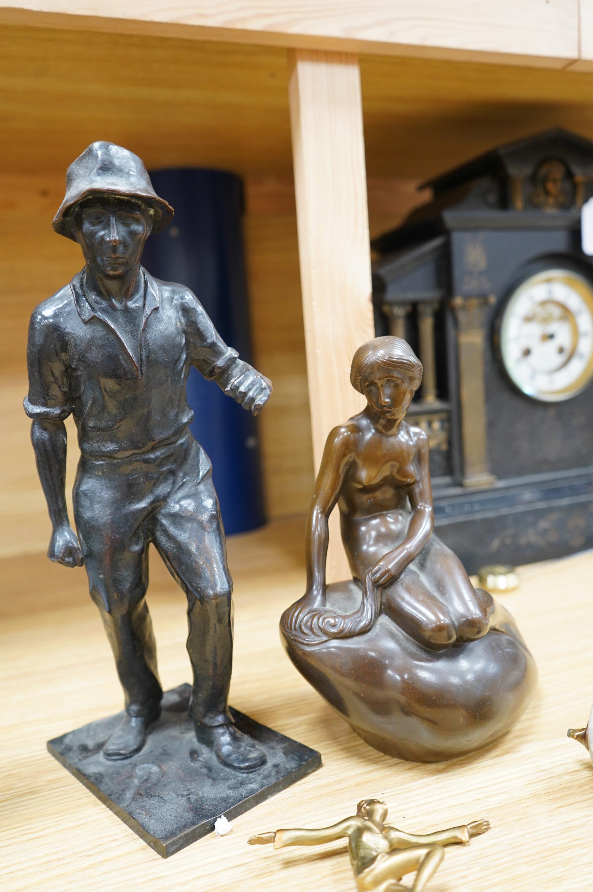 Five figural metal sculptures: a Copenhagen sculpture, signed Edvard Eriksen R.A, an Art Nouveau style bronze of a female figure stamped and dated, an enamelled figure of a musical Pierrot, another of a male figure and a